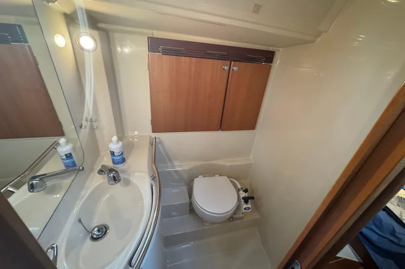 Slide: The Image of Bathroom interior of 2004 Dufour 40 Performance yacht with sink and toilet. - 32