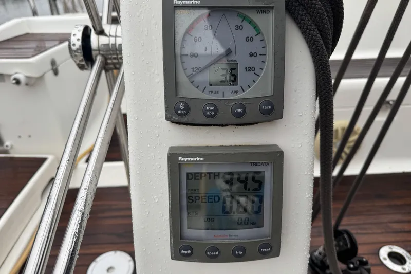 Slide: The Image of Close-up of Raymarine instruments on a 2004 Dufour 40 Performance sailboat. - 35