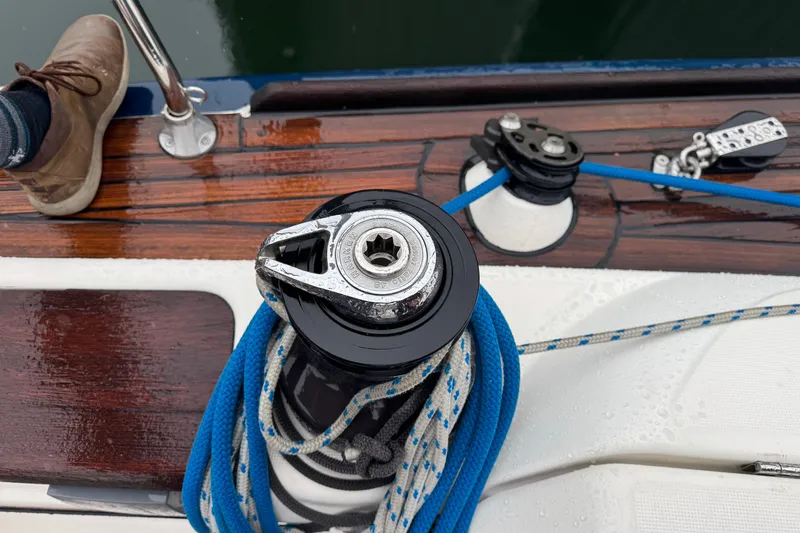 Slide: The Image of Winch and ropes on a 2004 Dufour 40 Performance sailboat deck. - 37