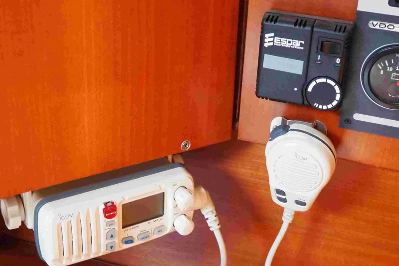 Slide: The Image of Control panel of 2004 Dufour 40 Performance yacht with Icom VHF radio and Espar heater system. - 45