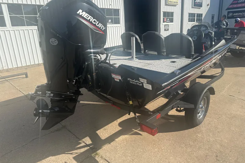 Slide: The Image of 2024 Tracker Pro Team 175 TF boat with Mercury engine on a trailer. - 7
