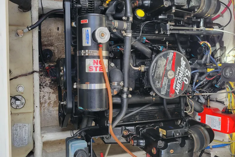 Slide: The Image of Engine compartment of a 2007 Bayliner 245 Cruiser with Mercury 5.0L engine. - 29