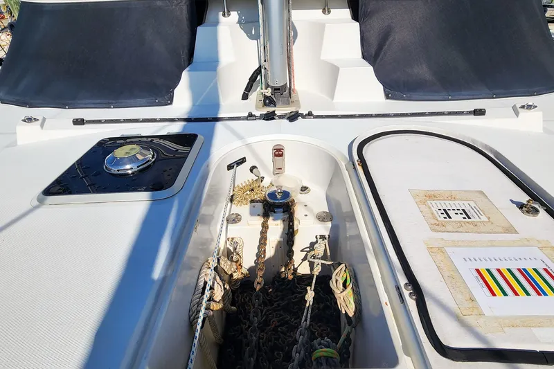 Slide: The Image of 2007 Antares Catamarans PDQ 44i deck with anchor chain and hatch details. - 12