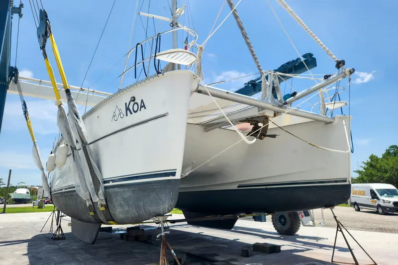 Slide: The Image of 2007 Antares Catamarans PDQ 44i catamaran in dry dock, undergoing maintenance. - 2