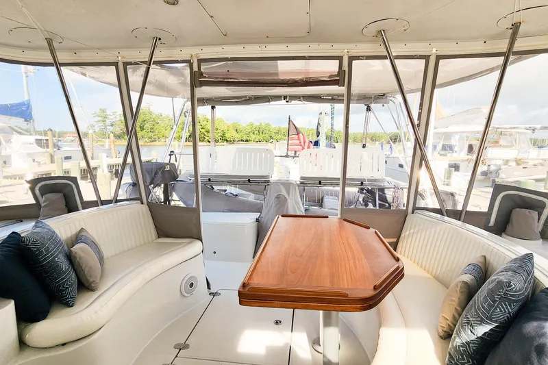 Slide: The Image of Luxurious 2007 Antares Catamarans PDQ 44i interior with elegant seating and wooden table. - 22