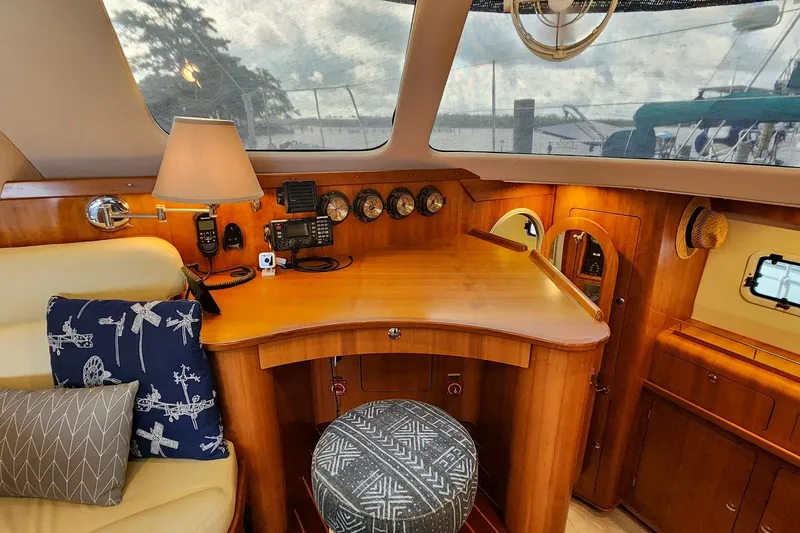 Slide: The Image of Luxurious interior of 2007 Antares Catamarans PDQ 44i with wooden desk and nautical decor. - 26