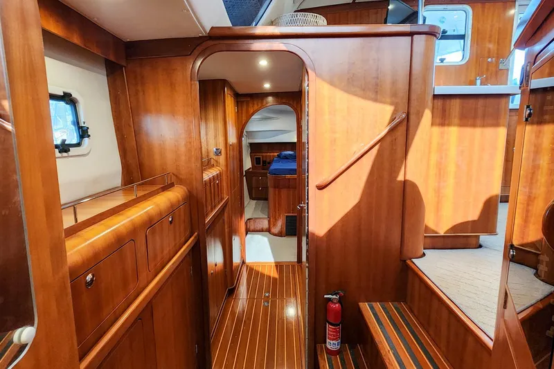 Slide: The Image of Luxurious 2007 Antares Catamarans PDQ 44i interior with polished wood finish and cozy cabin. - 29