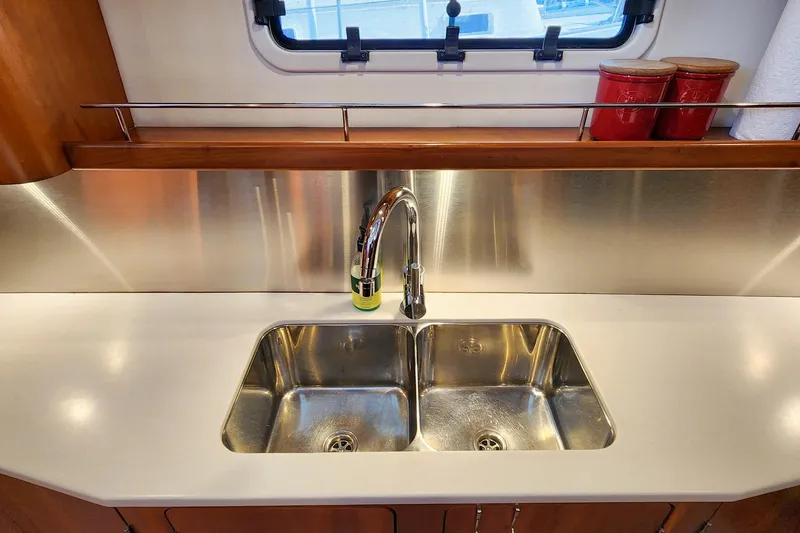 Slide: The Image of Stainless steel sink in 2007 Antares Catamarans PDQ 44i kitchen with modern faucet. - 35
