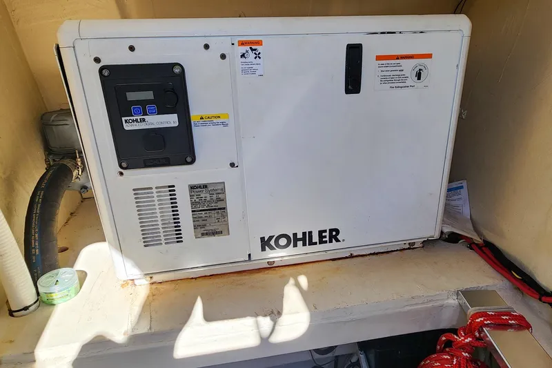 Slide: The Image of Kohler generator in 2007 Antares Catamarans PDQ 44i, engine compartment view. - 48