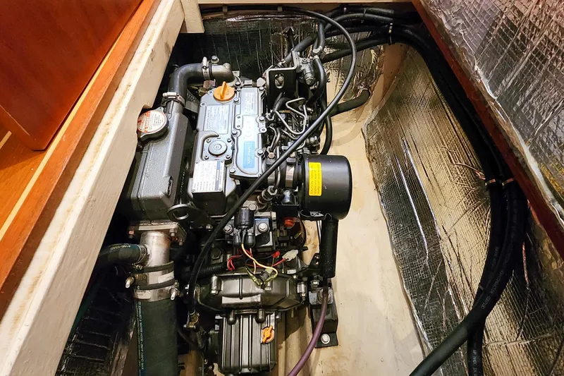 Slide: The Image of Engine compartment of a 2007 Antares Catamarans PDQ 44i, showcasing detailed mechanical components. - 52