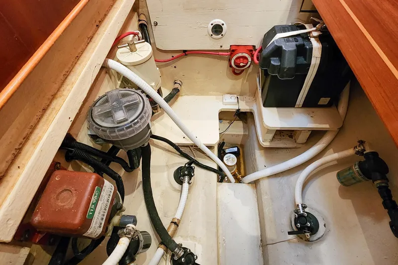 Slide: The Image of Engine compartment of 2007 Antares Catamarans PDQ 44i, showcasing wiring and components. - 57