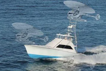 The Image of 1986 Ocean Yachts 55 Super Sport cruising on open water, showcasing sleek design and performance. - 0