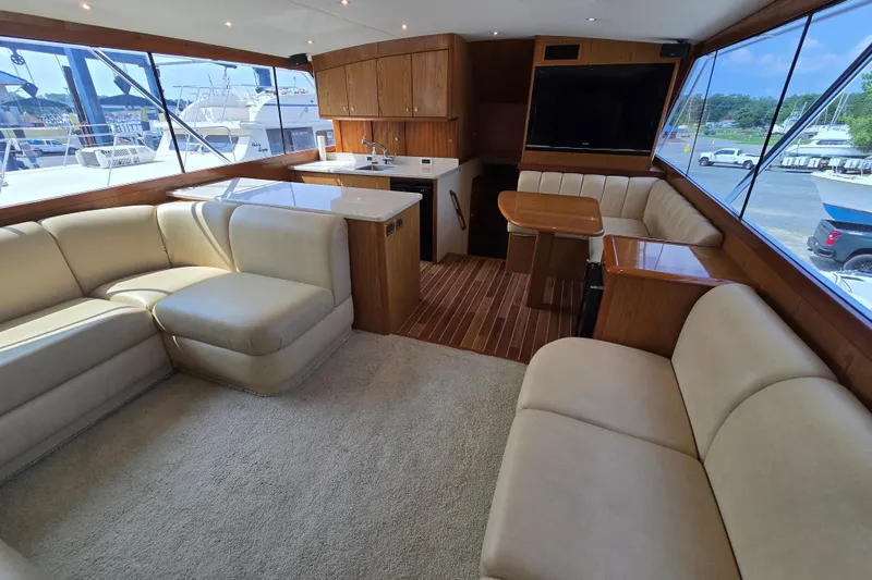 Slide: The Image of Luxurious interior of 1986 Ocean Yachts 55 Super Sport with plush seating and modern amenities. - 14