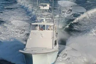 Slide: The Image of 1986 Ocean Yachts 55 Super Sport cruising on open water. - 3