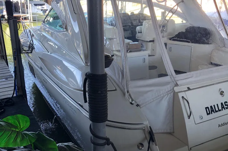 Slide: The Image of 2006 Cruisers Yachts 420 Express docked, featuring sleek design and spacious interior. - 32