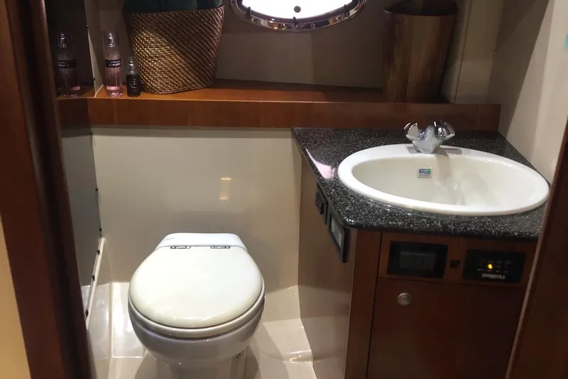 Slide: The Image of Bathroom interior of 2006 Cruisers Yachts 420 Express with sink and toilet. - 35