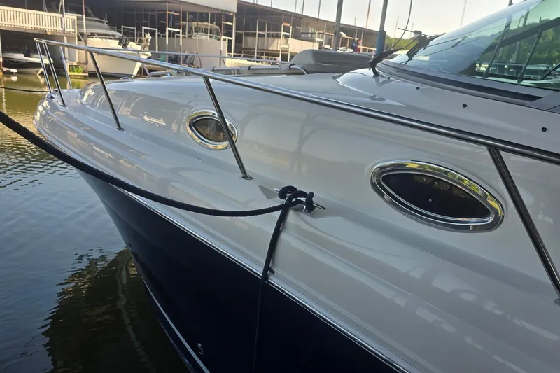 Slide: The Image of 2005 Sea Ray 340 Sundancer yacht docked at marina, side view. - 44