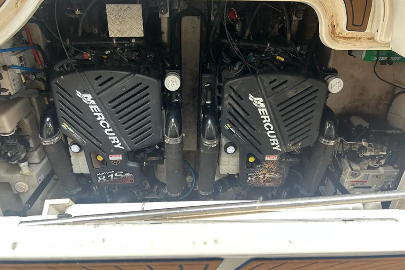 Slide: The Image of Engine compartment of a 2005 Sea Ray 340 Sundancer with twin Mercury engines. - 6