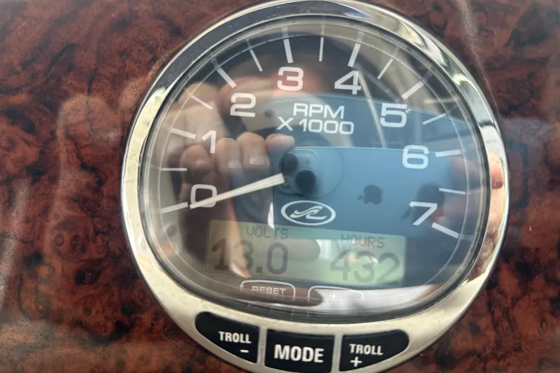 Slide: The Image of Close-up of 2005 Sea Ray 340 Sundancer RPM gauge displaying 13 volts and 432 hours. - 7