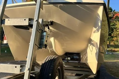 Slide: The Image of 2007 C-Dory Tomcat 255 Pilothouse on trailer, rear view, sunny day. - 10