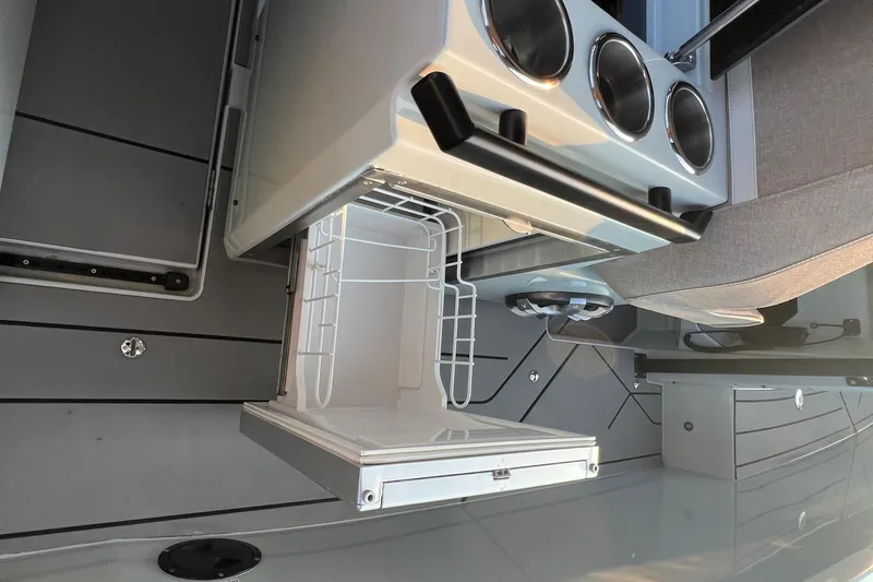 Slide: The Image of 2023 Saxdor 320 GTO interior with open storage compartment and modern design. - 20