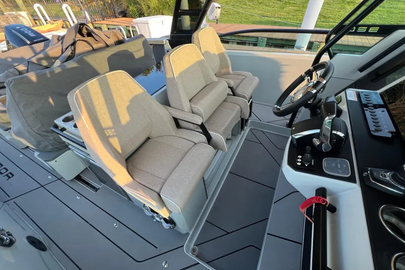 Slide: The Image of 2023 Saxdor 320 GTO cockpit with modern seating and control panel. - 22