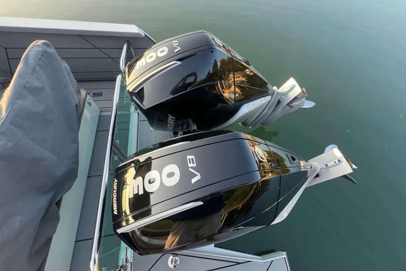 Slide: The Image of Twin Mercury V8 engines on a 2023 Saxdor 320 GTO boat. - 8