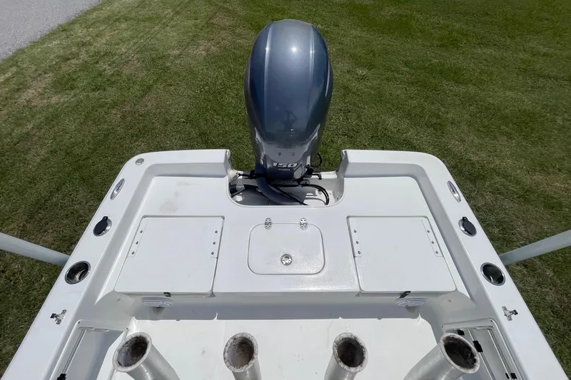 Slide: The Image of 2019 Sea Hunt BX 20 BR boat with outboard motor, viewed from above on grass. - 15