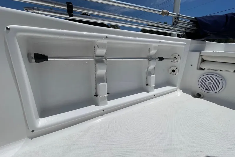Slide: The Image of 2019 Sea Hunt BX 20 BR boat interior with rod holder and speaker. - 18