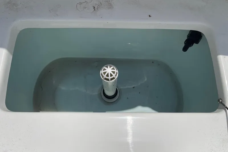 Slide: The Image of Livewell in 2019 Sea Hunt BX 20 BR boat, filled with water. - 20