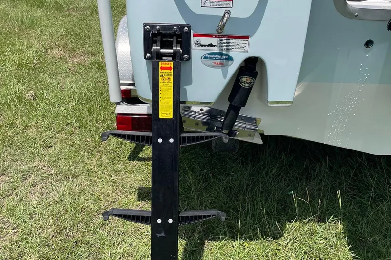 Slide: The Image of Rear view of 2019 Sea Hunt BX 20 BR boat with trailer and hydraulic system. - 22