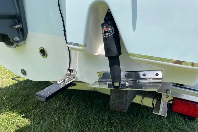 Slide: The Image of 2019 Sea Hunt BX 20 BR boat with Lenco trim tab on grass. - 25