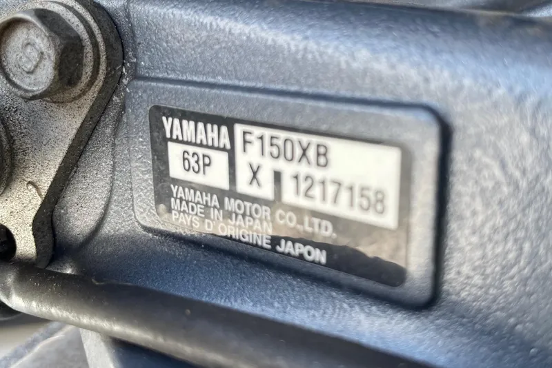 Slide: The Image of Close-up of Yamaha F150XB engine label on 2019 Sea Hunt BX 20 BR boat. - 34