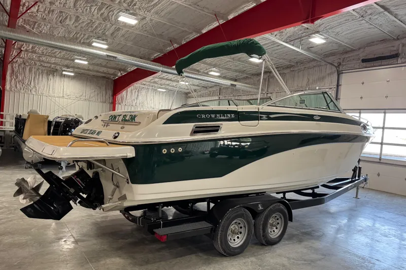 Slide: The Image of 2001 Crownline 288 BR boat on trailer in indoor storage facility. - 4