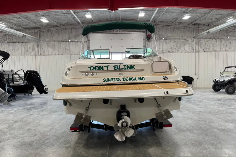 Slide: The Image of 2001 Crownline 288 BR boat in garage, "Don't Blink" text, Sunrise Beach, MO. - 5