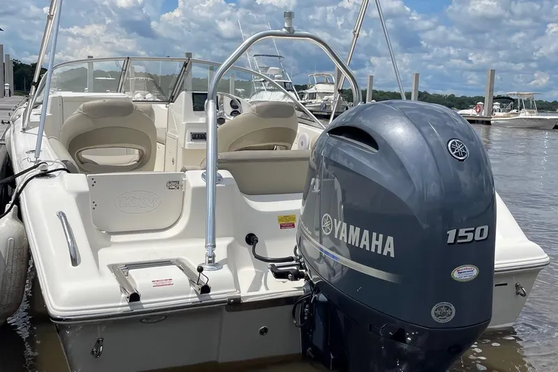 Slide: The Image of 2023 Key West 203 DFS boat with Yamaha 150 engine docked on a sunny day. - 17