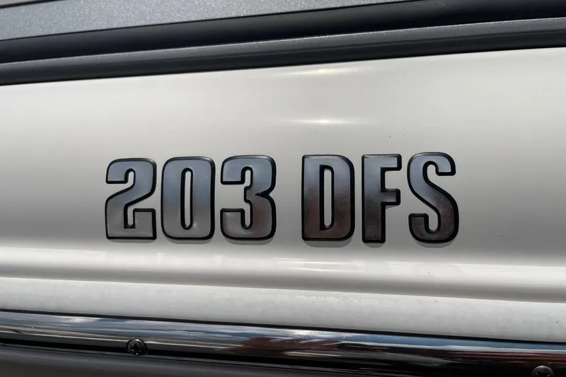 Slide: The Image of Close-up of 2023 Key West 203 DFS model emblem on boat exterior. - 22
