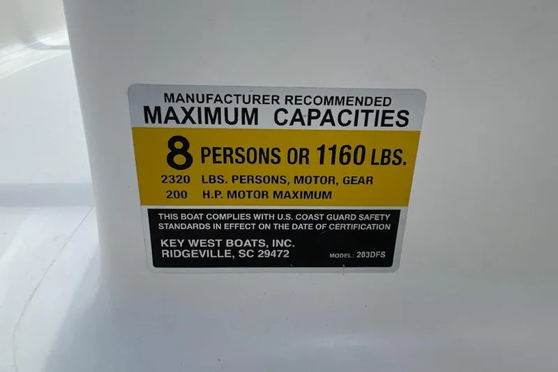 Slide: The Image of Key West 203 DFS 2023 boat capacity label, 8 persons or 1160 lbs, 200 HP max. - 23