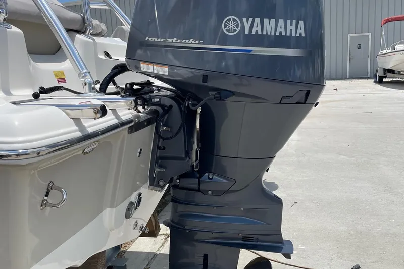 Slide: The Image of 2023 Key West 203 DFS boat with Yamaha four-stroke outboard motor. - 27