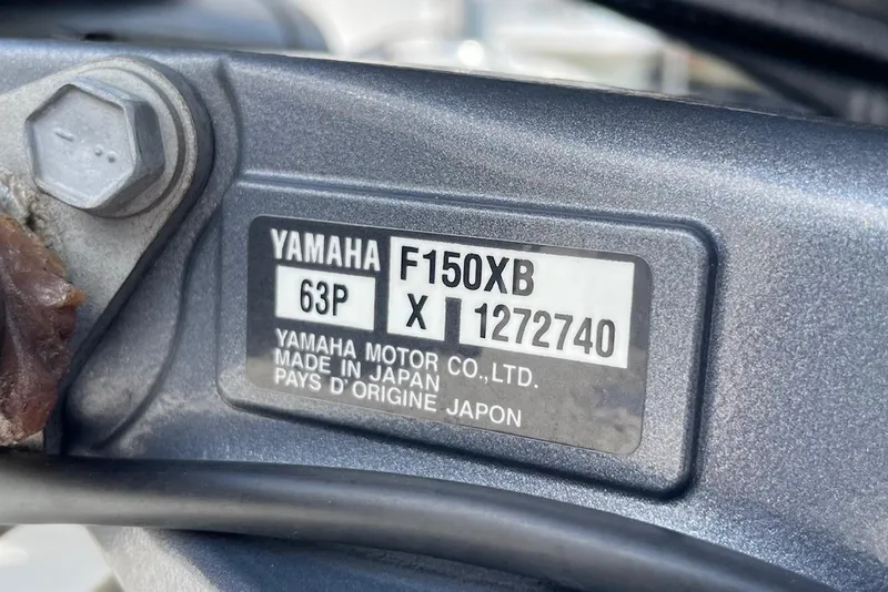 Slide: The Image of Yamaha F150XB engine label on 2023 Key West 203 DFS boat, made in Japan. - 29