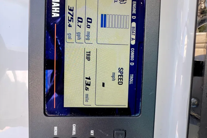 Slide: The Image of Yamaha boat display showing speed, trip distance, and fuel data on a 2019 Sea Hunt 27 Gamefish CC. - 13