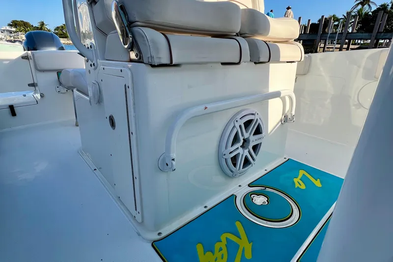 Slide: The Image of 2019 Sea Hunt 27 Gamefish CC boat interior with seating and speaker detail. - 6
