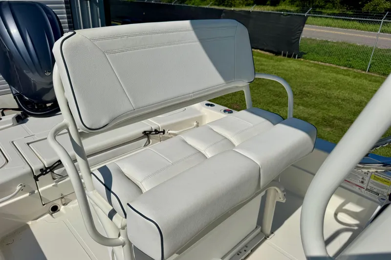 Slide: The Image of 2024 Skeeter SX 241 boat seat with white upholstery and sturdy frame. - 11