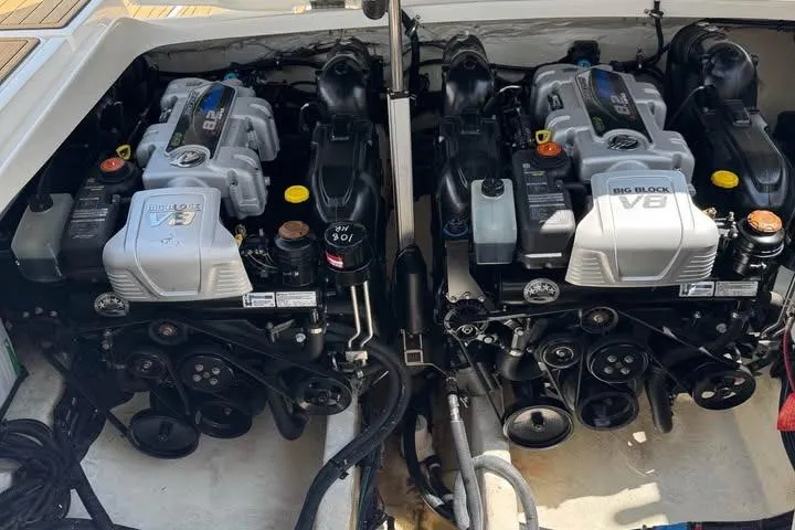 Slide: The Image of Twin V8 engines in a 2019 Sea Ray SLX 350 boat. - 12