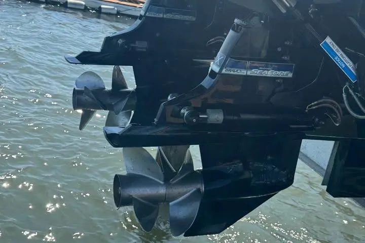 Slide: The Image of Propellers of a 2019 Sea Ray SLX 350 boat in water. - 13