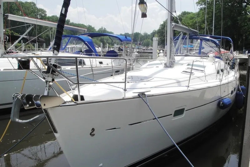 Slide: The Image of 2006 Beneteau Oceanis Clipper 423 sailboat docked in a marina. - 1