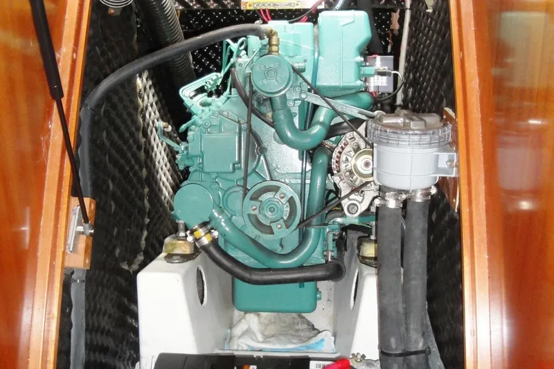 Slide: The Image of Engine compartment of 2006 Beneteau Oceanis Clipper 423 sailboat, showcasing detailed machinery. - 3