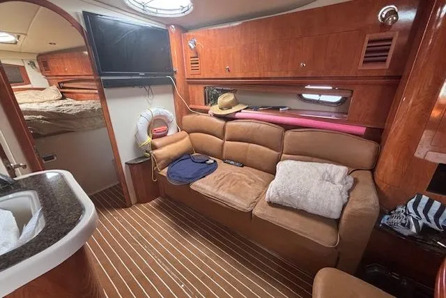 Slide: The Image of 2005 Four Winns 378 Vista yacht interior with bathroom and kitchenette. - 10