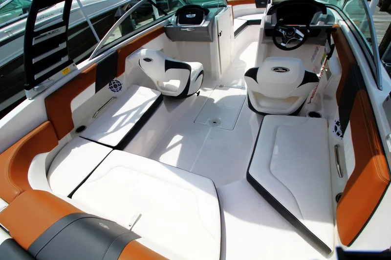 Slide: The Image of 2024 Chaparral 235 SSi OB boat interior with stylish seating and modern design. - 10