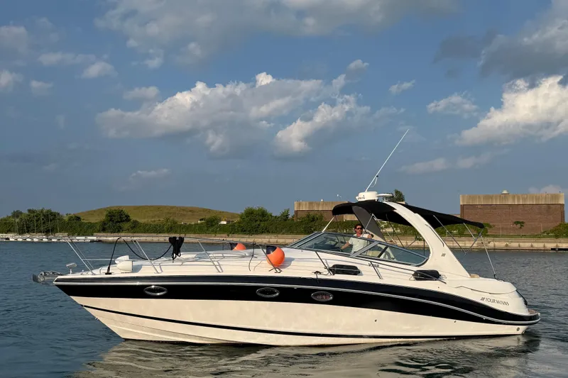 Slide: The Image of 2008 Four Winns V358 boat cruising on a sunny day with clear skies. - 4